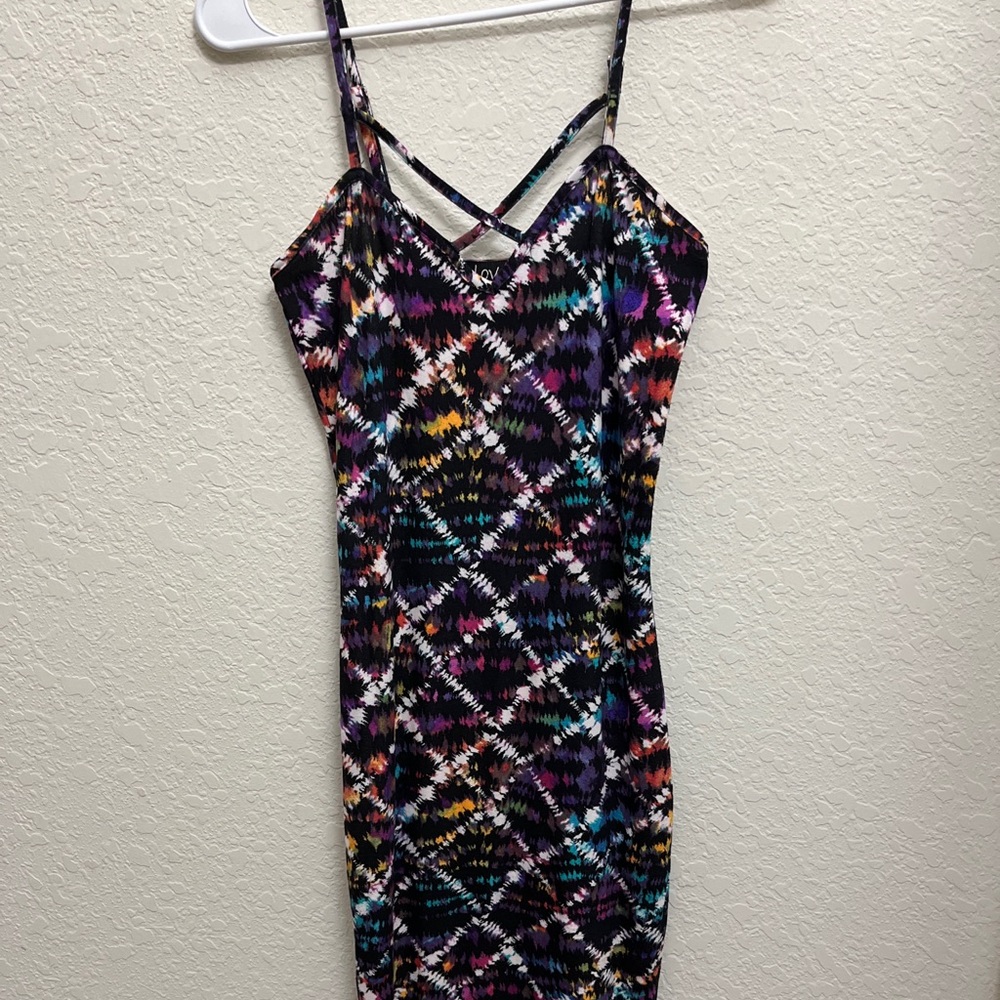 Dress is a little long, about knee length a little past the knees.